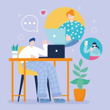 Sosyal medyayla bağlantılı dizüstü bilgisayarla sohbet eden genç adam