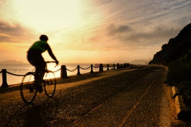 Man cycling at Golden Gate National Recreation Area clipart