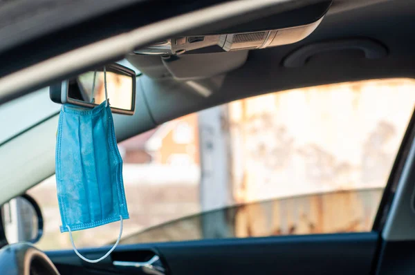 Responsible citizens of the country store spare antibacterial masks in the car.