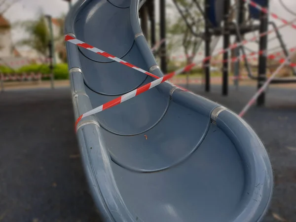 Closeup Sealed Playground Slide Red White Tape — Stock Photo, Image