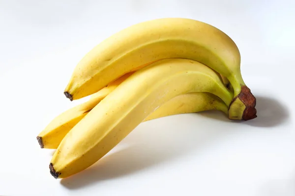 Algumas Bananas Fundo Branco Close — Fotografia de Stock