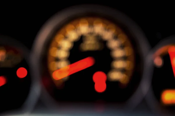 Blurred Speed Gauge in car — Stock Photo, Image