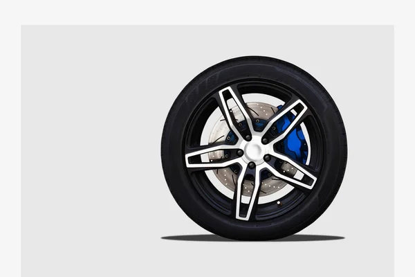 Close up de uma roda desportiva moderna com disco de freio e almofada de paquímetro — Fotografia de Stock