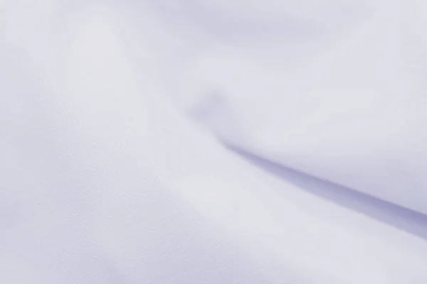 Clear background of cloth white in macro and blur background perfect for graphics and space for text.