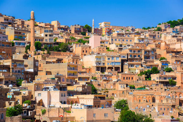 Historical buildings with many satellite dishes on tops in Mardin, Turkey