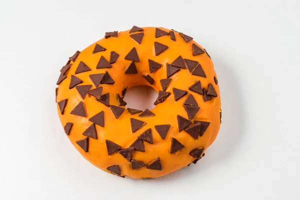 Donut de vidro laranja no fundo branco. Depósito plano . — Fotografia de Stock
