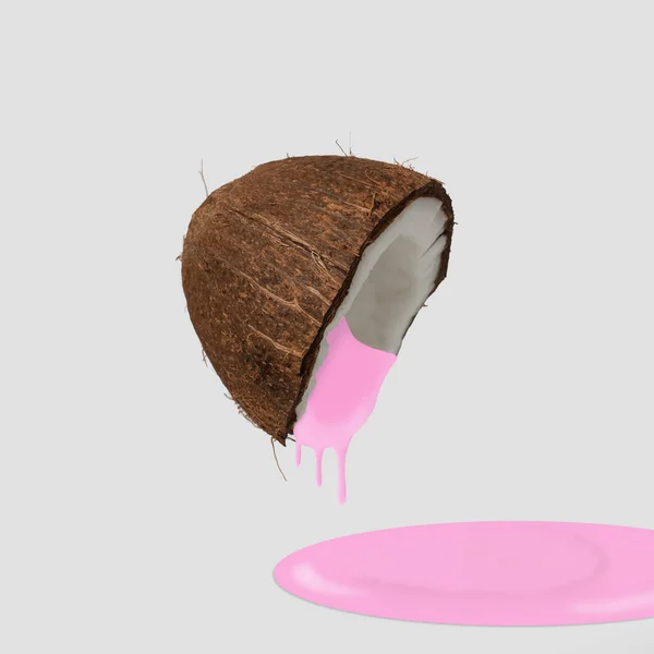 La mitad de coco agrietado con leche rosada vertiendo. Concepto mínimo —  Fotos de Stock