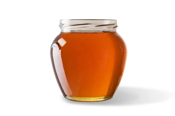 Мед в банці ізольований на білому тлі . — стокове фото