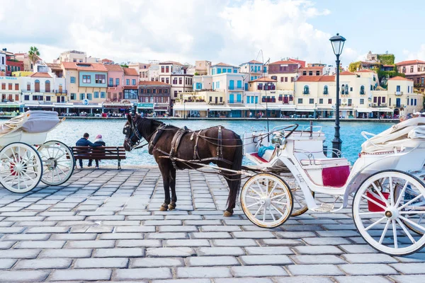 Chania, Crete - 04 November, 2017: Horse carriage in old harbour of Chania Stock Photo