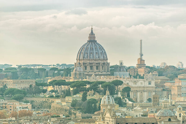 A view of the St Peter's basilica and Vatican in Rome. Italy. Toned.