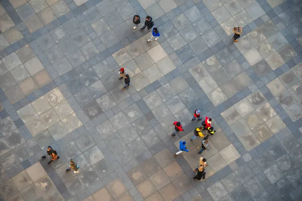 View of the people on the street from above.
