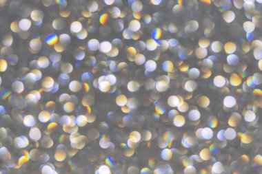 Renkli daire bokeh ışıklarıyla soyut arkaplan.