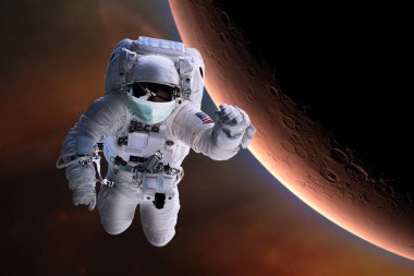 Yüzü maskeli astronot uzayda koruma sağlar. Dünya tıbbi konsepti. Bu görüntünün elementleri NASA tarafından desteklenmektedir.