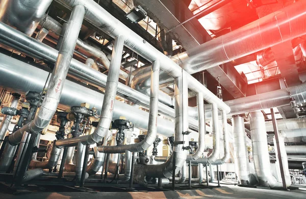 Different size and shaped pipes and valves at a power plant — Stock Photo, Image