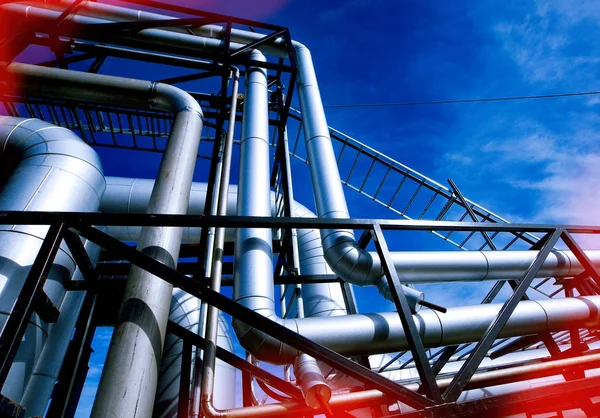 Industrial zone, Steel pipelines and valves against blue sky — Stock Photo, Image