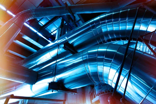 Industrial zone, Steel pipelines and cables in blue tones — Stock Photo, Image