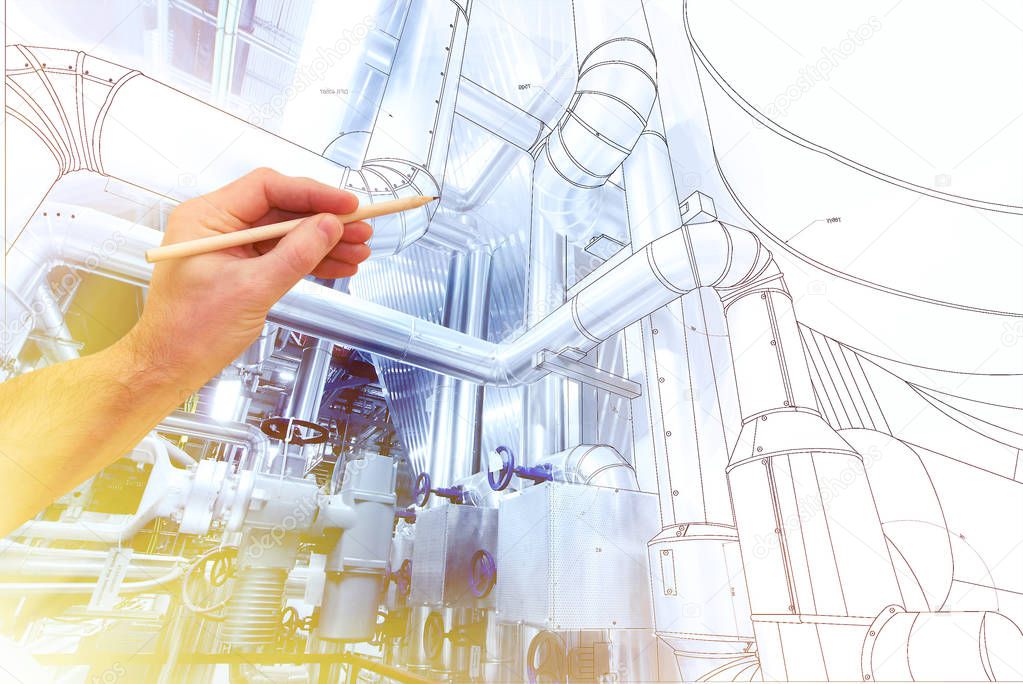 man's hand draws a design of factory combined with photo of mode