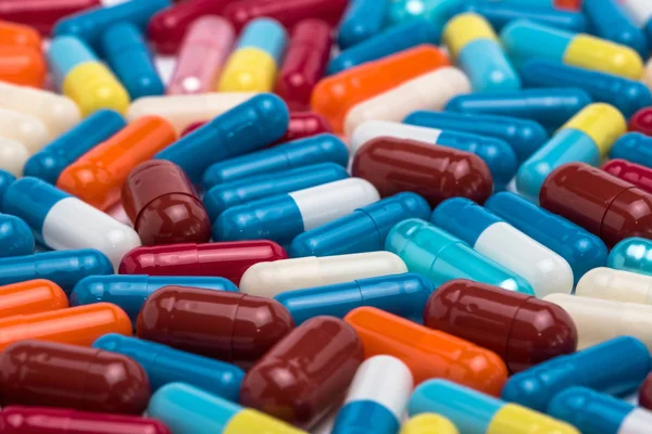 Bundle of colorful capsules — Stock Photo, Image