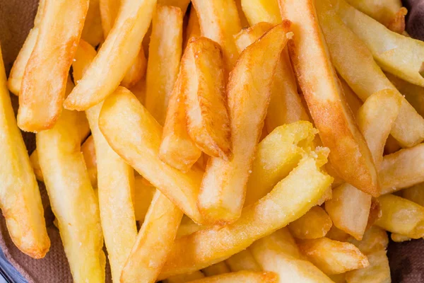 Patates cipsi, patates kızartması arka planı, yakın plan.