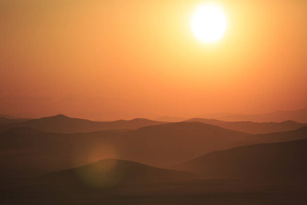 Mountains and prairies under the sun