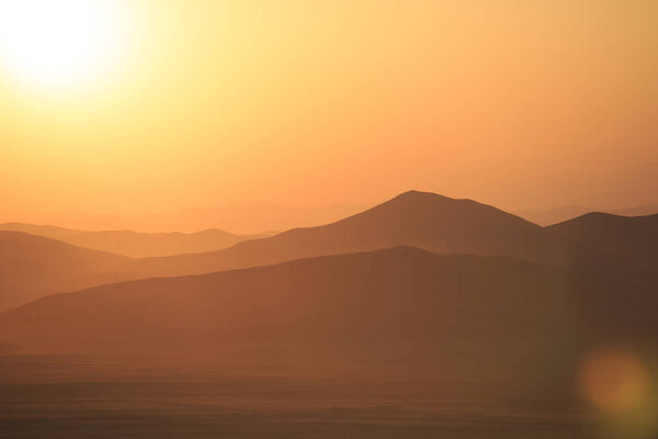 Mountains and prairies under the sun