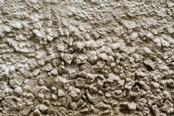Starý fasáda kámen šedá zeď textura pozadí — Stock fotografie