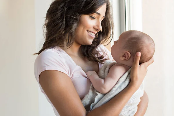 Woman with newborn baby — Stock Photo, Image