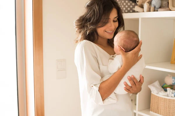 Woman with newborn baby — Stock Photo, Image