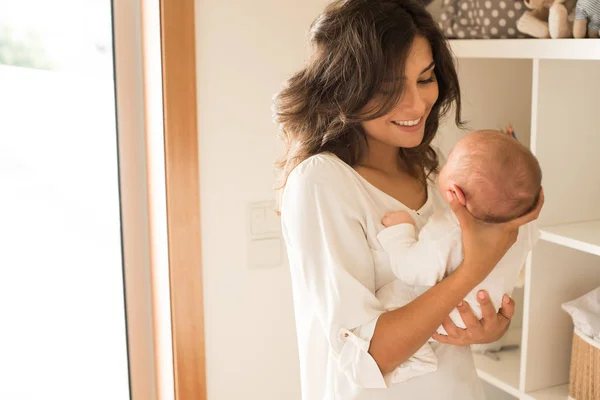 Woman with newborn baby — Stock Photo, Image