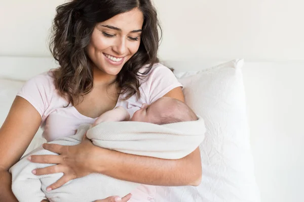 Mother holding newborn baby — Stock Photo, Image