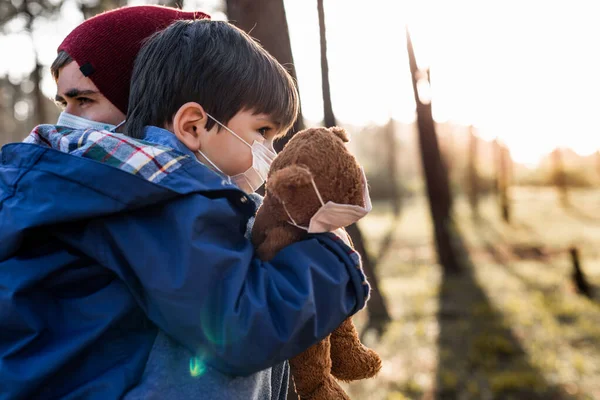 Concerned Father Son Using Air Protection Masks — Stock Photo, Image