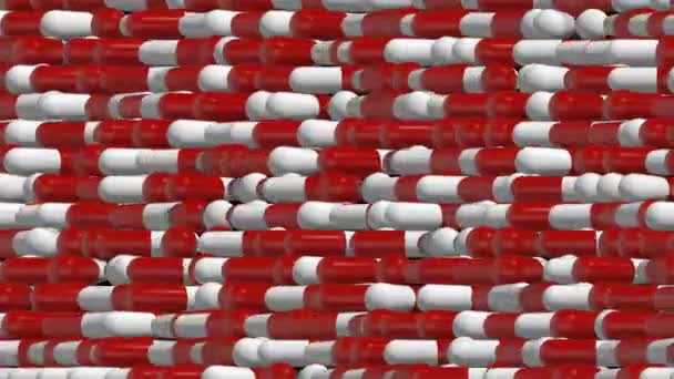 Une couche dense de pilules tourne formant un mur de protection. Le contexte cinématographique médical. boucle transparente . — Video