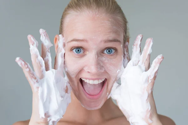 Blonde Woman Face Covered Suds Water Smiling Her Hands — Stock Photo, Image