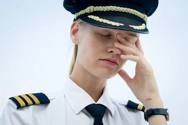 Gestresste Pilotin Mit Kopfschmerzen — Stockfoto