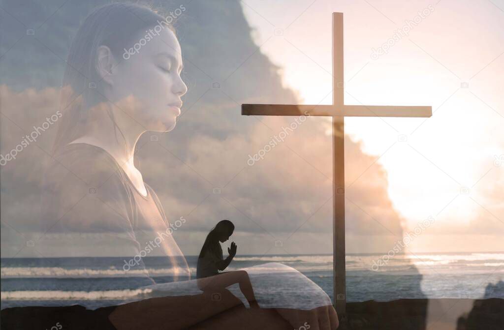 A young lady doing a yoga pose on a mountain top island beach, during a orange sunset. Peaceful Zen.