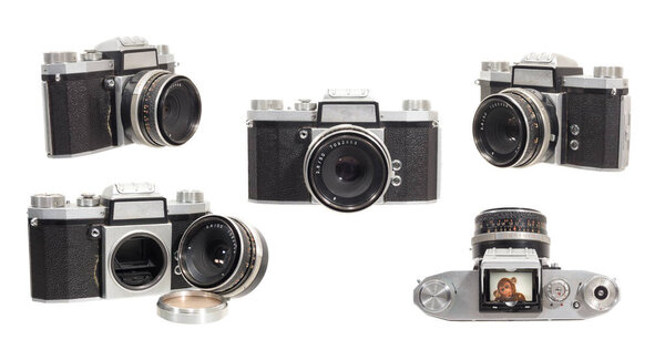 старинная антикварная фотокамера с фотографиями
