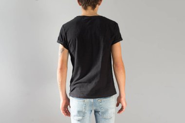 Young man in black mockup tshirt