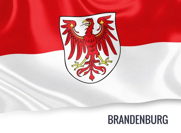 Bandera del estado alemán de Brandenburgo ondeando sobre un fondo blanco aislado. El nombre del estado se incluye debajo de la bandera. Renderizado 3D . —  Fotos de Stock