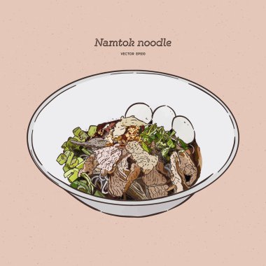 Thai stlye noodle çorbası domuz köftesi ve sebze ile servis edilir. 