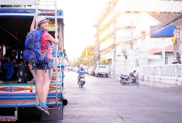 Woman in hat enjoying trip