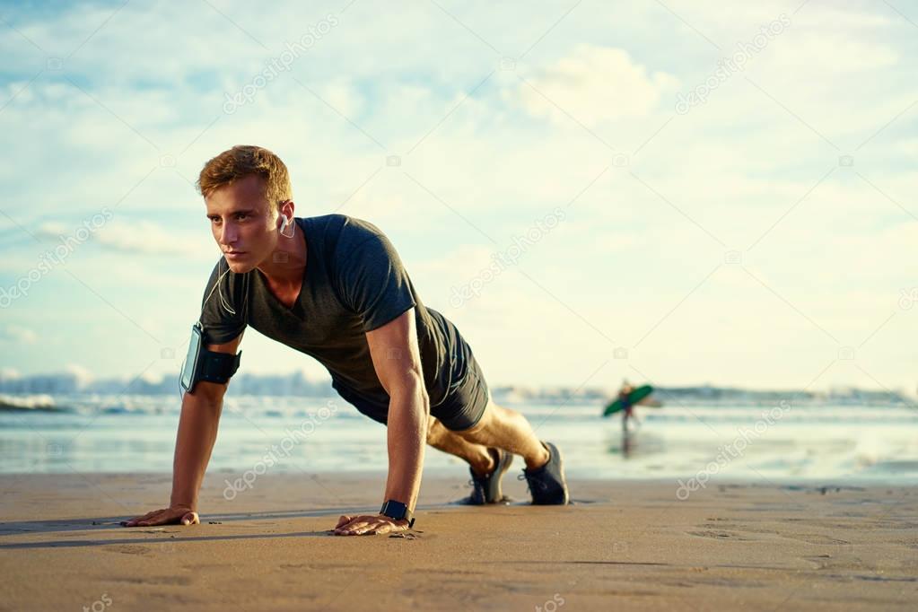 Young man doing push-ups 
