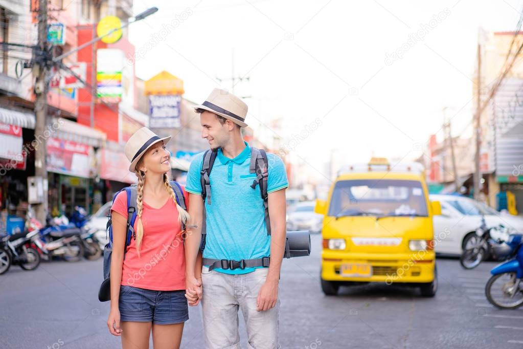 Couple of backpackers walking together 