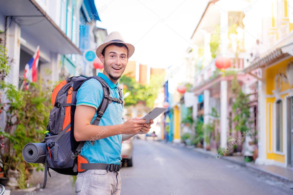 Young man using digital tablet 