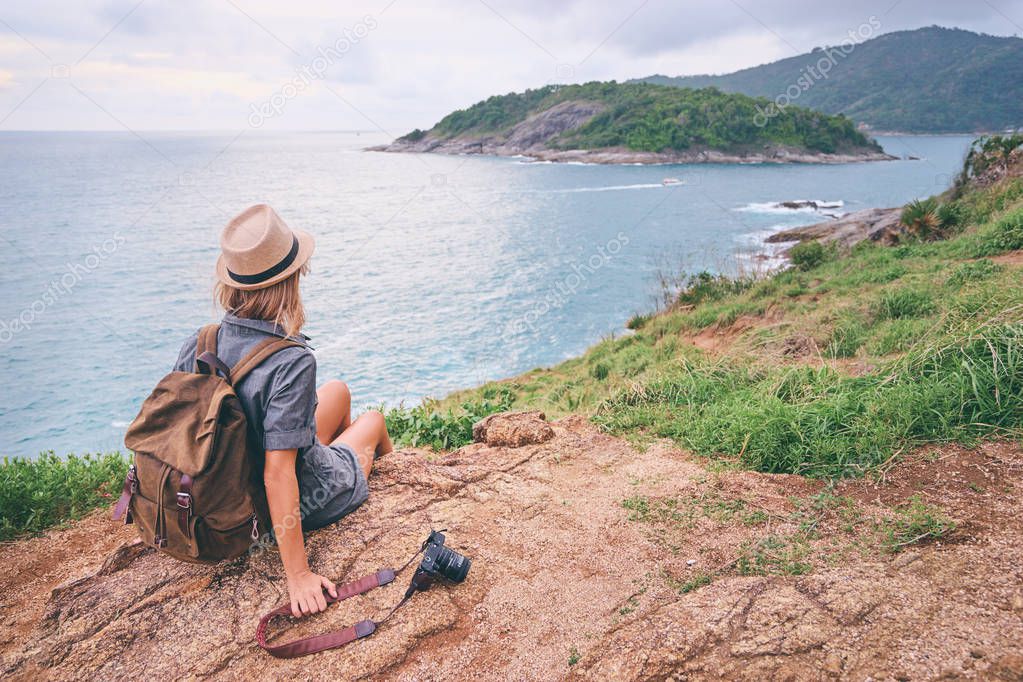 woman with camera and rucksack