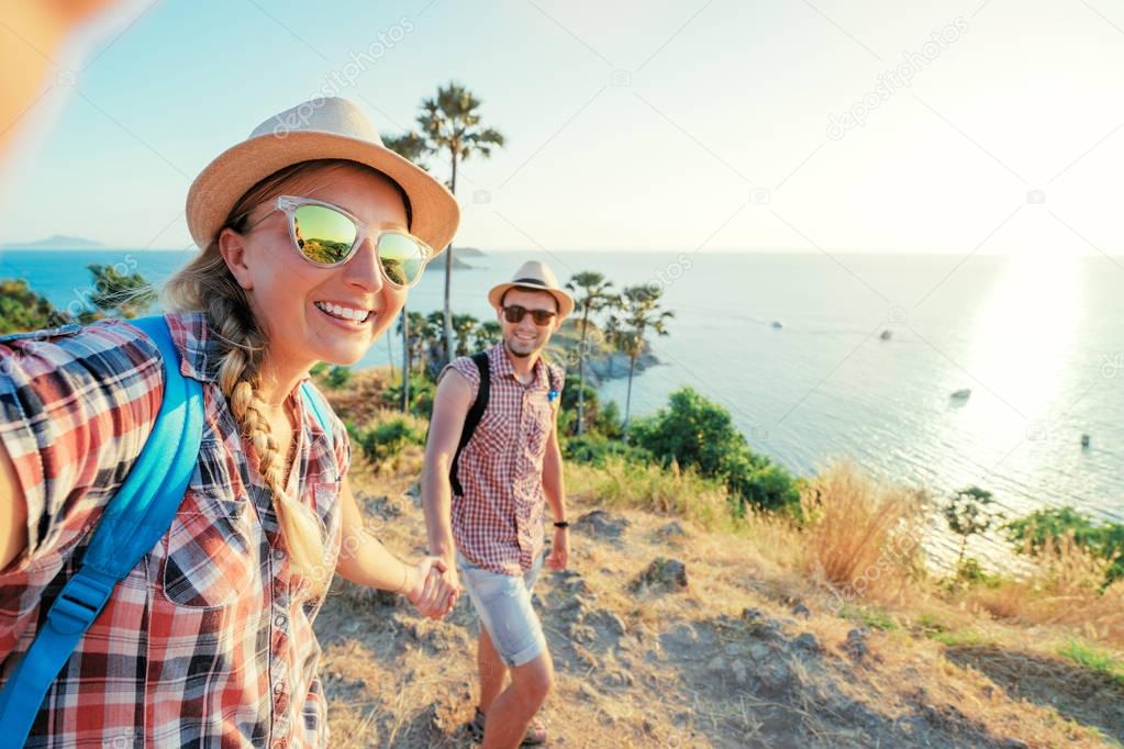 Young loving couple taking selfie 