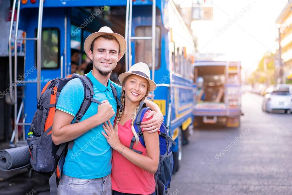 Couple of backpackers walking together 