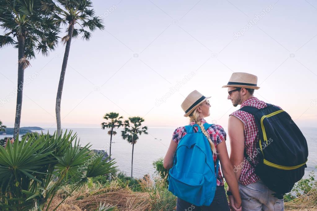 Loving couple walking on mountains 