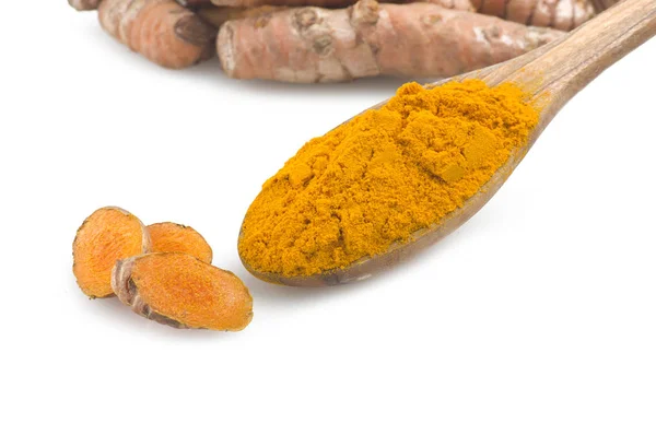 Radice di curcuma e alcune fette — Foto Stock