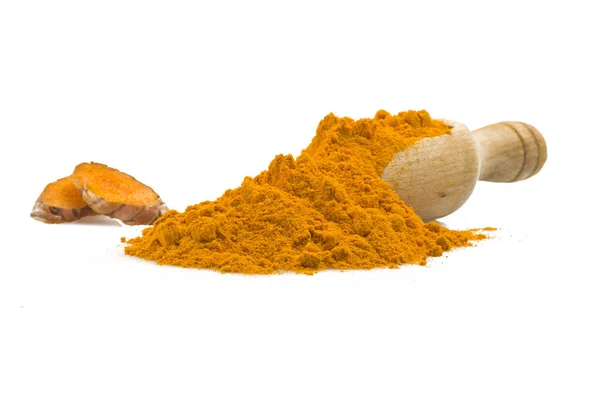 Turmeric root and some slices Stock Image