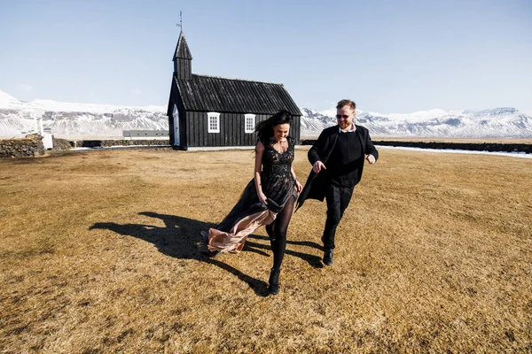 Good Looking Happy Couple Running Valley Iceland Mountains Black Church — Stok fotoğraf